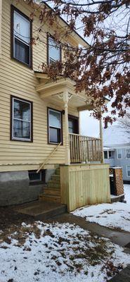 Porch repair.  Better Homes supported the porch roof and rebuilt the deck.