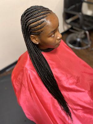 Individuals in back and cornrows in front