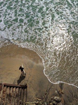 Client and friend of Bazilians Health - professional surfer pictured at Swami's Beach in Encinitas gazing at the Pacific.
 (Photo by Dr. J)