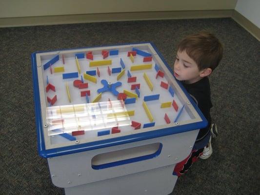 magnetic maze in waiting room for kids to play with