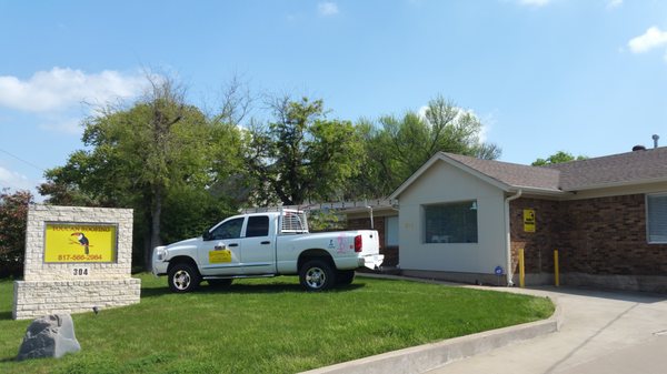 Office building and one of the company trucks.