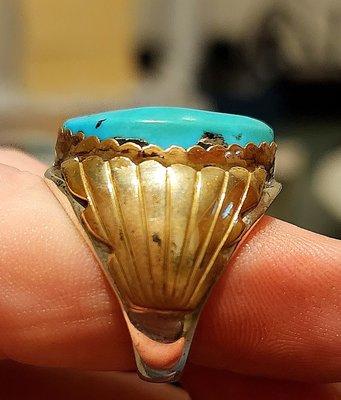 Wonderful sterling, gold and turquoise ring that Gold Rush Jewelry sized pefectly to my request and specifications.