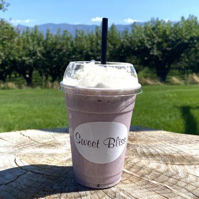 huckleberry milkshake with whipped cream