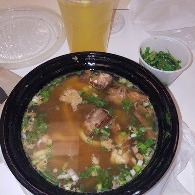 Pork noodle soup lunch special with seaweed salad and ginger honey tea