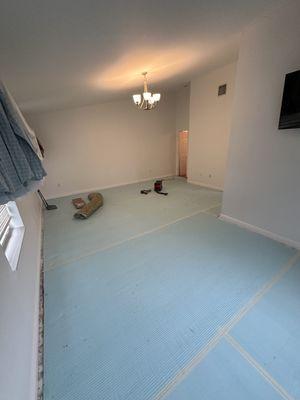 Remove carpet to put down new hardwood floor