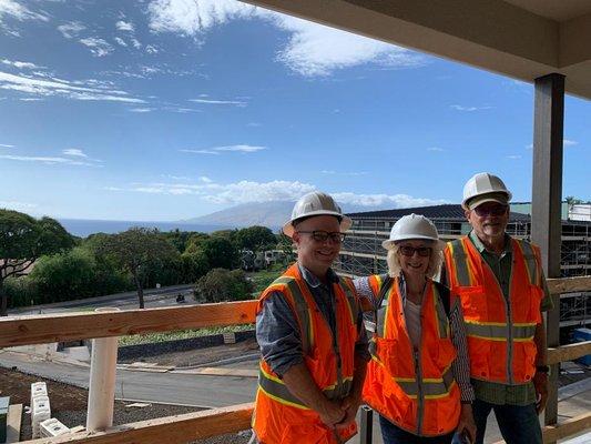 Realtor Pete Jalbert with some clients at their condo under construction in Wailea