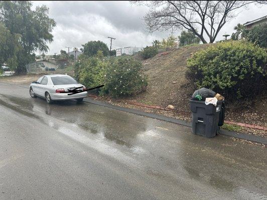 The car they said that the trash cans are too close to  It's 15ft away the drivers lazy