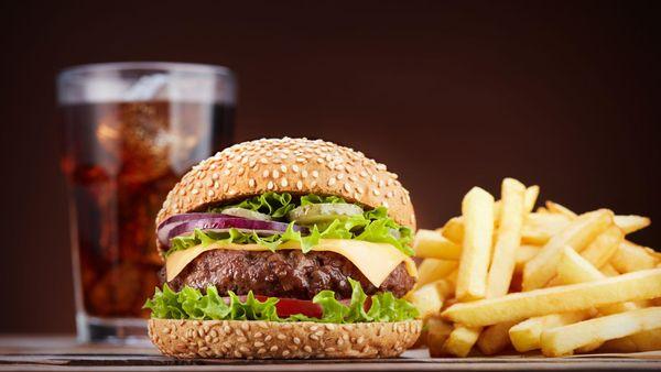 Burger and Fires with Cola in the Background. The new and improved location at Harrah's Hoosier Park has a new restaurant, Da...