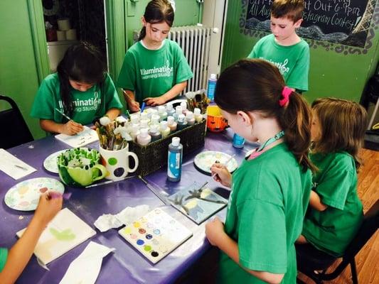 Students painting in Summer Camp