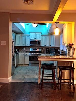 After photo of useless breezeway transformed into a custom kitchen!