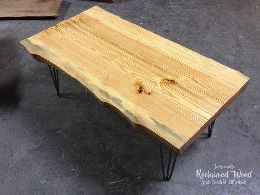 Reclaimed beetle-killed pine slab coffee table.