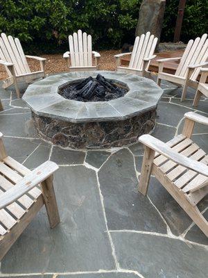 Fire pit and a circular patio surround:)