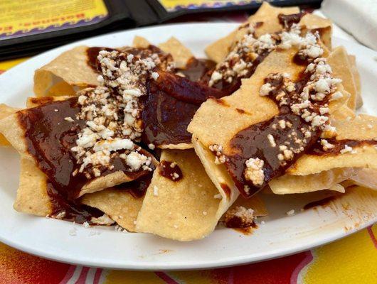 Chips with mole sauce