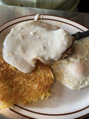 Chicken fried steak hash browns and eggs