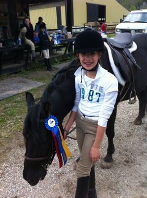 Brianna and Her Champion Ribbon on Darky!