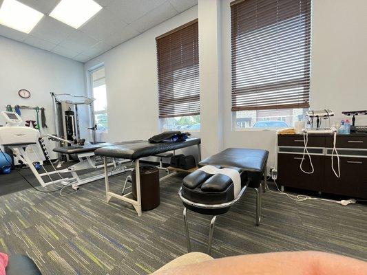 physical therapy area: ultrasound station is on right. With two tables to lay on, the one to the extreme right is not pictured.