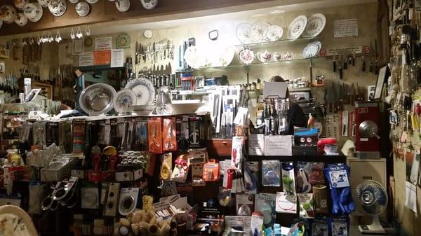 Checkout counter with knives behind the counter