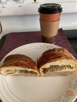 Sausage and Cheese Croissant with Hot Large Size Black Coffee.