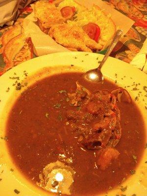 First time eating gumbo and it is not what I imagined does not taste like seafood one bit filled with flavor.