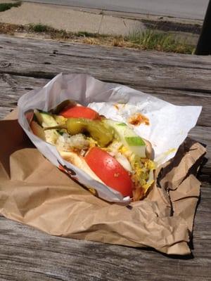 There's a chili dog buried beneath all those classic toppings. A mess to eat but oh so good.