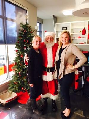 Team members with Santa