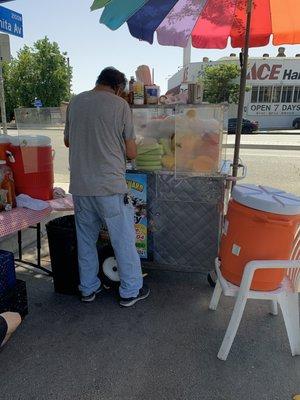 Armando cutting fruit!