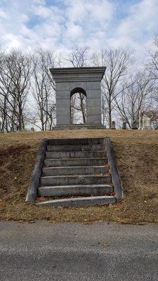 Monument on the hill overlooking cemetery