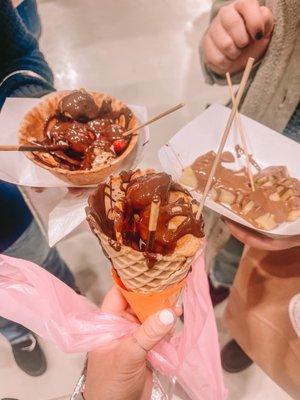 Fondue waffle cone, fondue waffle bowl, and pineapple with milk chocolate drizzle