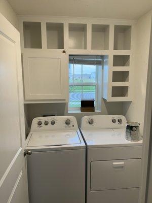 Another laundry room built in organizing area