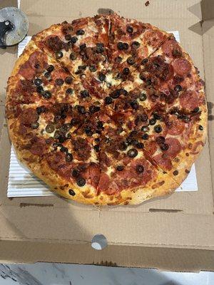 Pepperoni, black olives, bacon, extra cheese, extra sauce