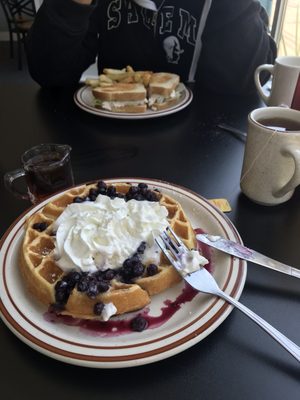 Delicious Belgian waffle with blueberries, whipped cream and pure NH maple syrup; chicken salad sandwich and fries; coffees