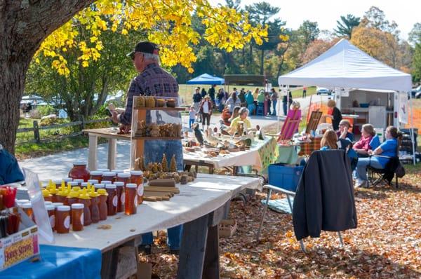 local artisans demonstrate their crafts and sell handmade items at Farm Day each October