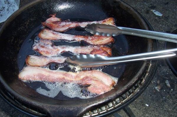 Cooking bacon for our bacon beer.