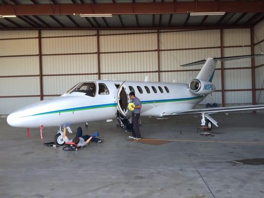 Cleaning and detailing some jets at Bakersfield Jet Center.