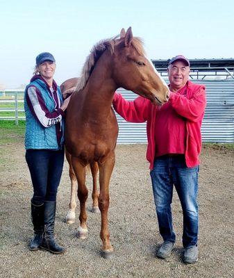 Dr. Parker with Loki (the gorgeous horse) and good friend Cat at Golden M Family Farms.