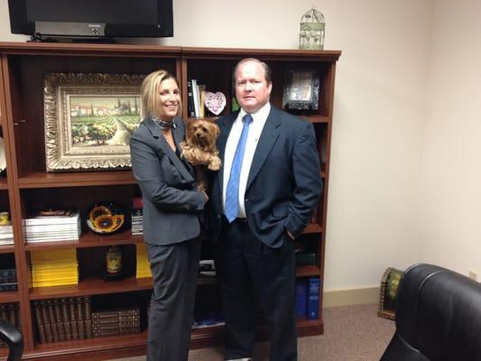 Marlo pictured with Of-Counsel, David E. Ryan of Ryan Law, and service dog Coco Channel.