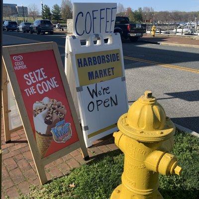 Cones, coffee market at yellow hydrant