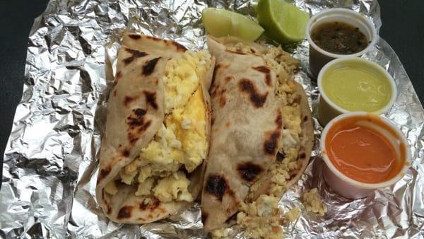 Bacon & egg and potato & egg breakfast tacos with salsas from Mi Taco Poncho's (food court)