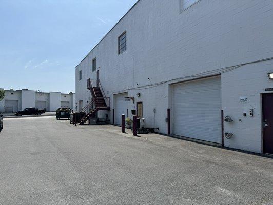 Entrance to business on back side of industrial building.