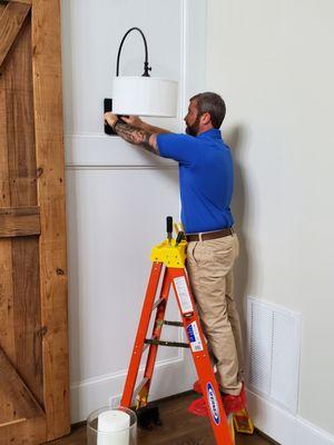 Installation of interior light fixture.