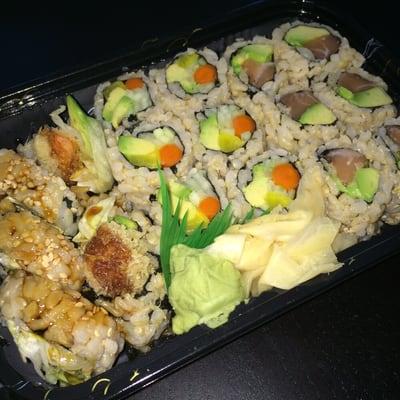 Lunch special w brown rice. Vegetable roll shrimp tempura roll and salmon avocado roll