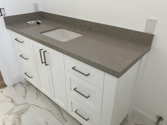 Quartz in guest bathroom.