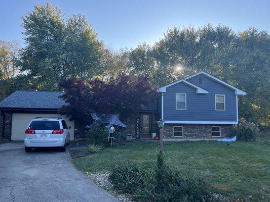 New Roof, Everlast Composite Siding, Black seamless Gutters & Downspouts!