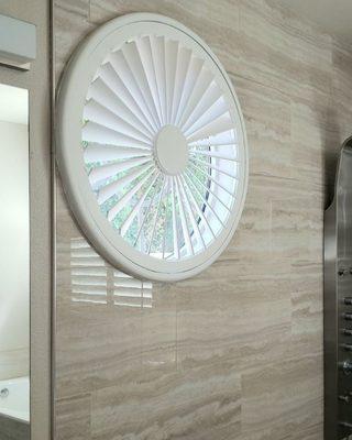 Bathroom porthole sunburst shutter. Yes, it is possible.