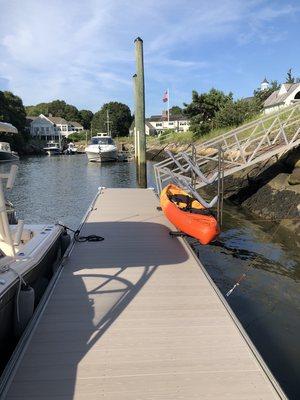 Re-decked this customer's float with modern AZEK decking and mounted and installed the kayak and SUP rack.