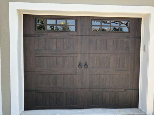 10x7 Walnut Carriage Garage Door with custom hardware.