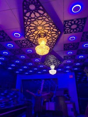 Beautiful drop/false ceiling with chandeliers, as well as 2 color led lights.