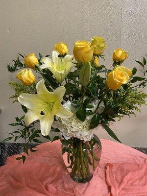 A dozen yellow roses... Not your typical arrangement