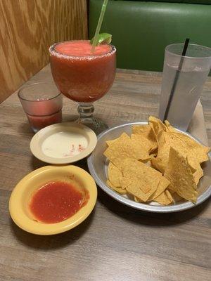 Chips, salsa and a big strawberry margarita