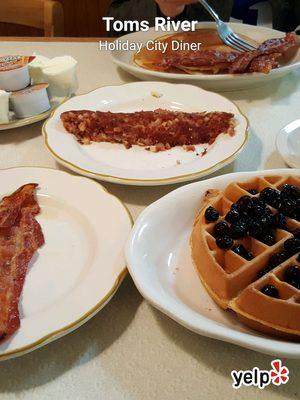 Blueberry belgian waffles, side of bacon, side of well done corned beef hash, and she'll have the pancakes!!!